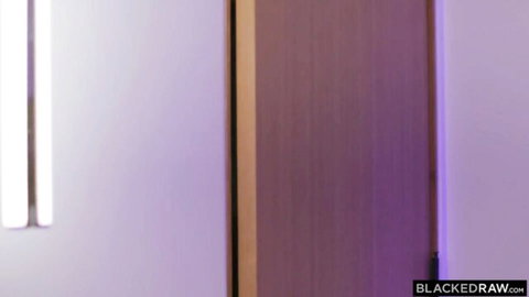 Empty purple neon lit room with door in BlackedRaw porn video setup