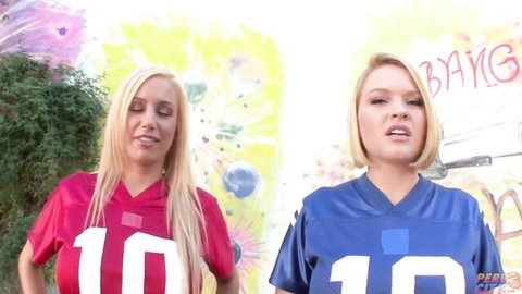 Two blonde cheerleaders in sexy football jerseys posing seductively