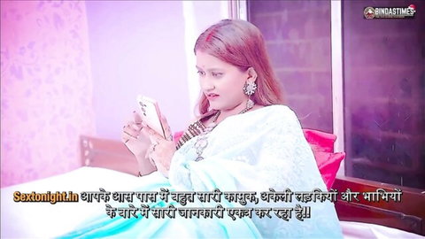 Sexy Indian bhabhi in white saree looks at phone before hot pussy fuck session