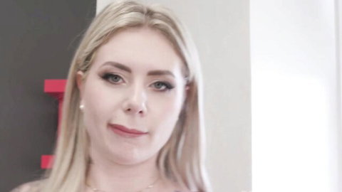 Seductive blonde with long hair pouting lips and tongue out teasing blowjob