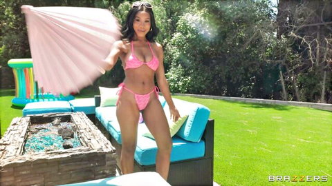 Jenna Foxx in skimpy pink bikini posing seductively