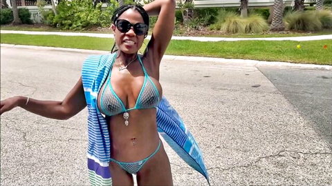 Raven Swallowz posing in sexy blue mesh bikini outdoors