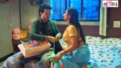 Mohinilaxmi in low-cut yellow top receives gift from Mohinibob, deep cleavage in Indian homemade scene