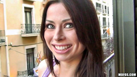 Veronica Vice smiling seductively with big tits in tight top