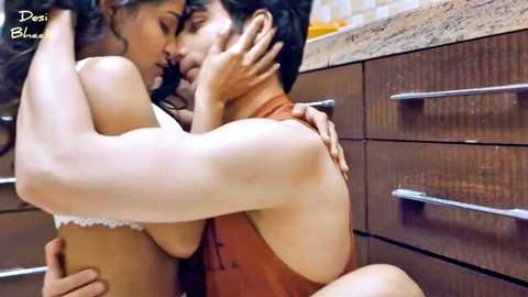 Desi bhabhi in white lingerie embraced and kissed passionately by boss