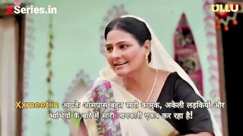 Busty Desi Bhabhi in white saree smiling seductively, hot Indian beauty