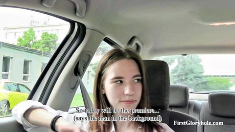 Young brunette Maya in car for first glory hole preview