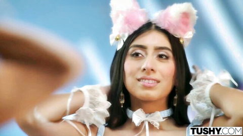 Violet Myers in pink cat ears and white lace lingerie, posing seductively