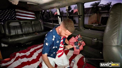 Melztube in patriotic flag outfit inside Bang Bus van