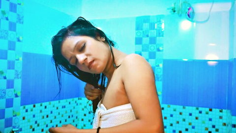 Indian sis-in-law in white towel after shower, wet hair and curvy figure
