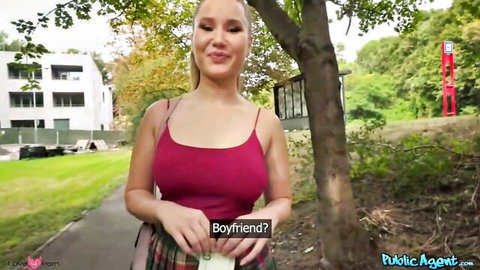 Cute blonde 18yo babe in red tank top and plaid skirt, public outdoor tease
