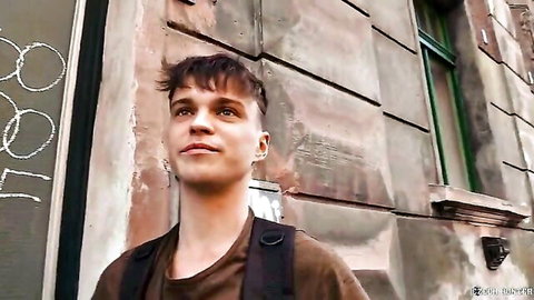 Young Czech guy in urban alley, teasing smile for wild handjob adventure