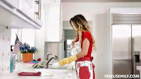 Lexi Stone busty blonde MILF in sexy apron washing dishes