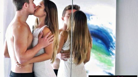 Eva Lovia passionately kissing shirtless boyfriend in white dress