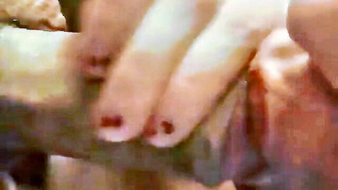 Woman with red nails gripping cock, craving semen in explicit handjob