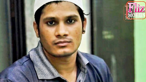 Indian man in taqiyah cap and shirt, adult video thumbnail