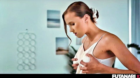 Brunette in sheer white slip squeezing her perky tits seductively