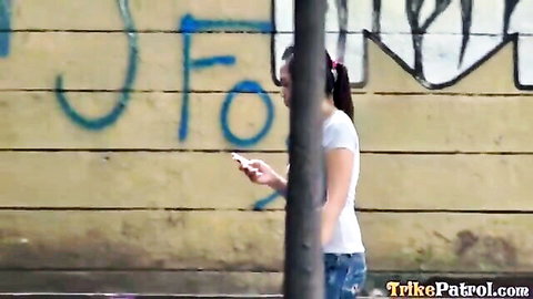 Asian woman Mercy in white top and jeans on Trike Patrol pickup