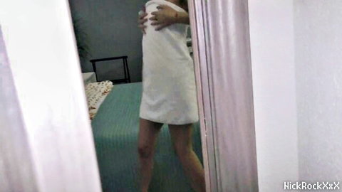 Petite brunette teen lifts short white dress exposing shaved pussy and ass in bedroom mirror selfie