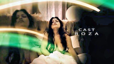 Seductive Indian babe Roza teasing topless in white sheet on bed