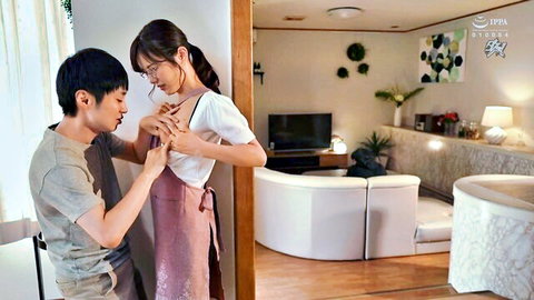 Young Japanese guy gropes busty housewife's tits while she wears pink apron and slipping top