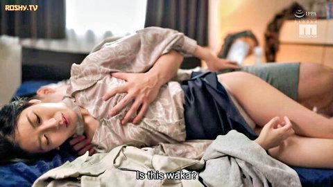 Desire A in intimate spooning embrace with man on bed, Asian milf in blouse and skirt