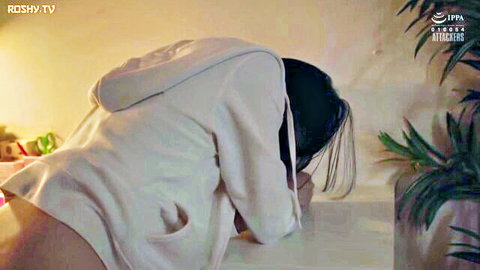 Japanese teen bent over table in white hoodie with pink panties down exposing bare pussy and ass