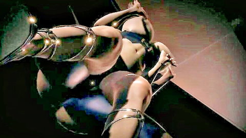 Goth girl suspended upside down in metal chains with legs spread wide exposing shaved pussy and ass
