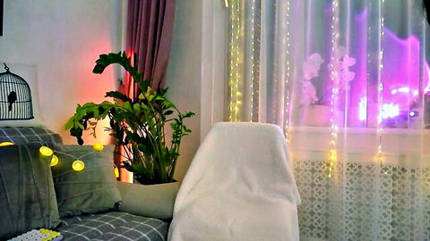 Sweety Rinushka cozy bedroom setup with plants and lights