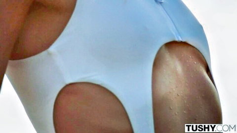 Dolly Dyson redhead in sexy white cutout bodysuit