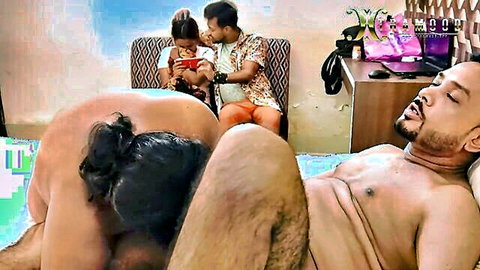 South Asian woman with huge bare ass squats over naked man's erect cock in reverse cowgirl while couple kisses on couch