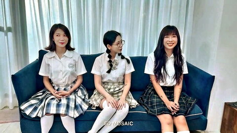 Three cute Chinese schoolgirls in plaid uniforms sitting together for orgy