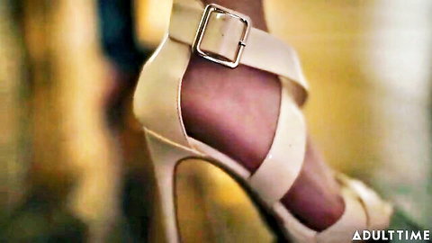 Casey Calvert's sexy leg in nude strappy high heels close-up