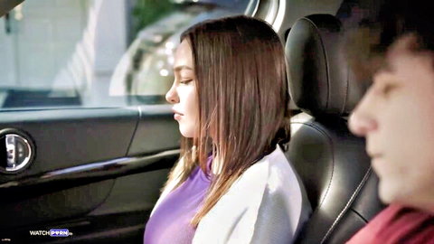 Rissa May eyes closed in intimate car moment with man nearby