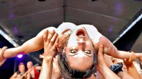 Barbara Bieber held upside down in wet gangbang by Anna De Ville and crowd