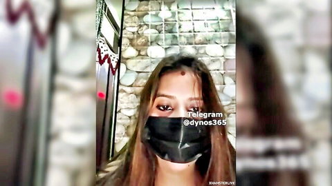 Sexy masked Indian woman with bindi teasing on webcam live