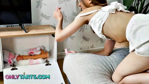 Petite Asian stepdaughter in white lingerie bending over sex toy drawer