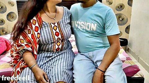 Indian MILF in saree with young guy, intimate couple pose from Hindi XXX video