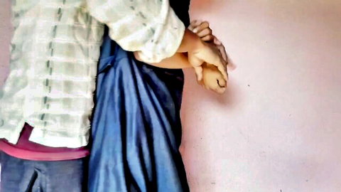Desi maid in blue dress hugged from behind by boss in white shirt