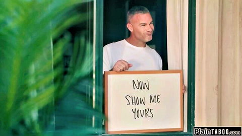 Mature teacher holds teasing sign for former Asian student Lulu Chu