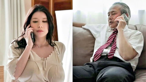 Asian woman in revealing blouse on phone with older suited man