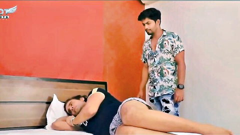 Indian babe with big ass in tight white shorts lying seductively on bed as guy watches hungrily