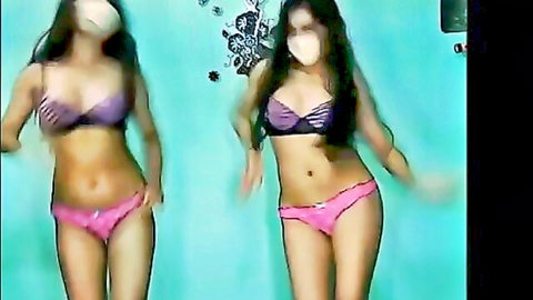 Two Indian women in bikinis dancing sensually as lesbians