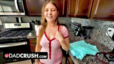 Busty redhead stepdaughter teases with cleavage in open pink cardigan