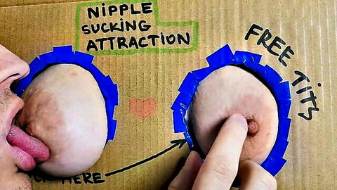 Man sucking and licking protruding natural tits nipple through homemade cardboard gloryhole
