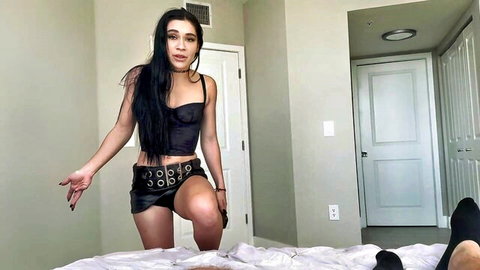 Goth step sister in black corset and mini skirt teases Scott Stark on bed