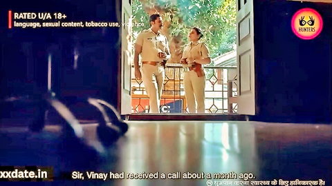 Indian police couple in uniforms on balcony, Desi bhabhi tease scene