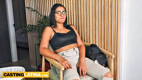 Marnie Latina stunner in black crop top and ripped shorts posing seductively