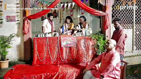 Indian women in colorful sarees at festive stall in raunchy group scene