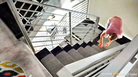 Curvy blonde bends over stairs showing off big ass in tight pink shorts teasing cock